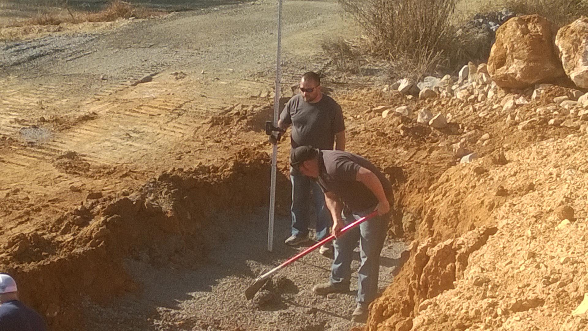 Ditch digging side of road